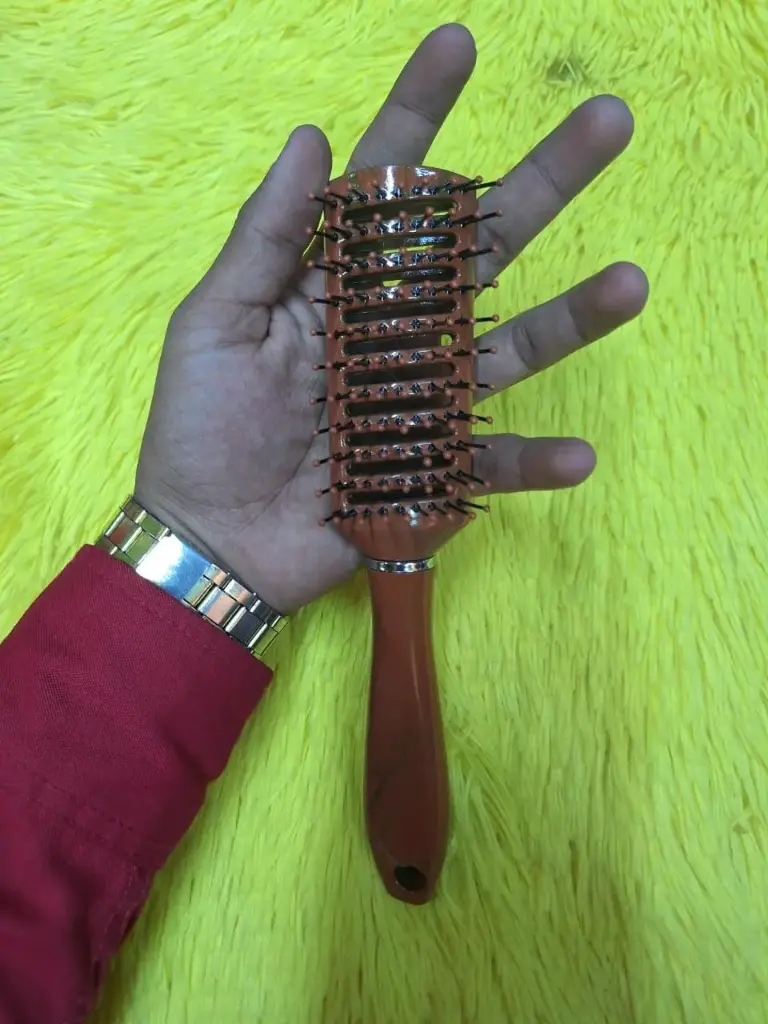 Cepillo para peinar de plástico 